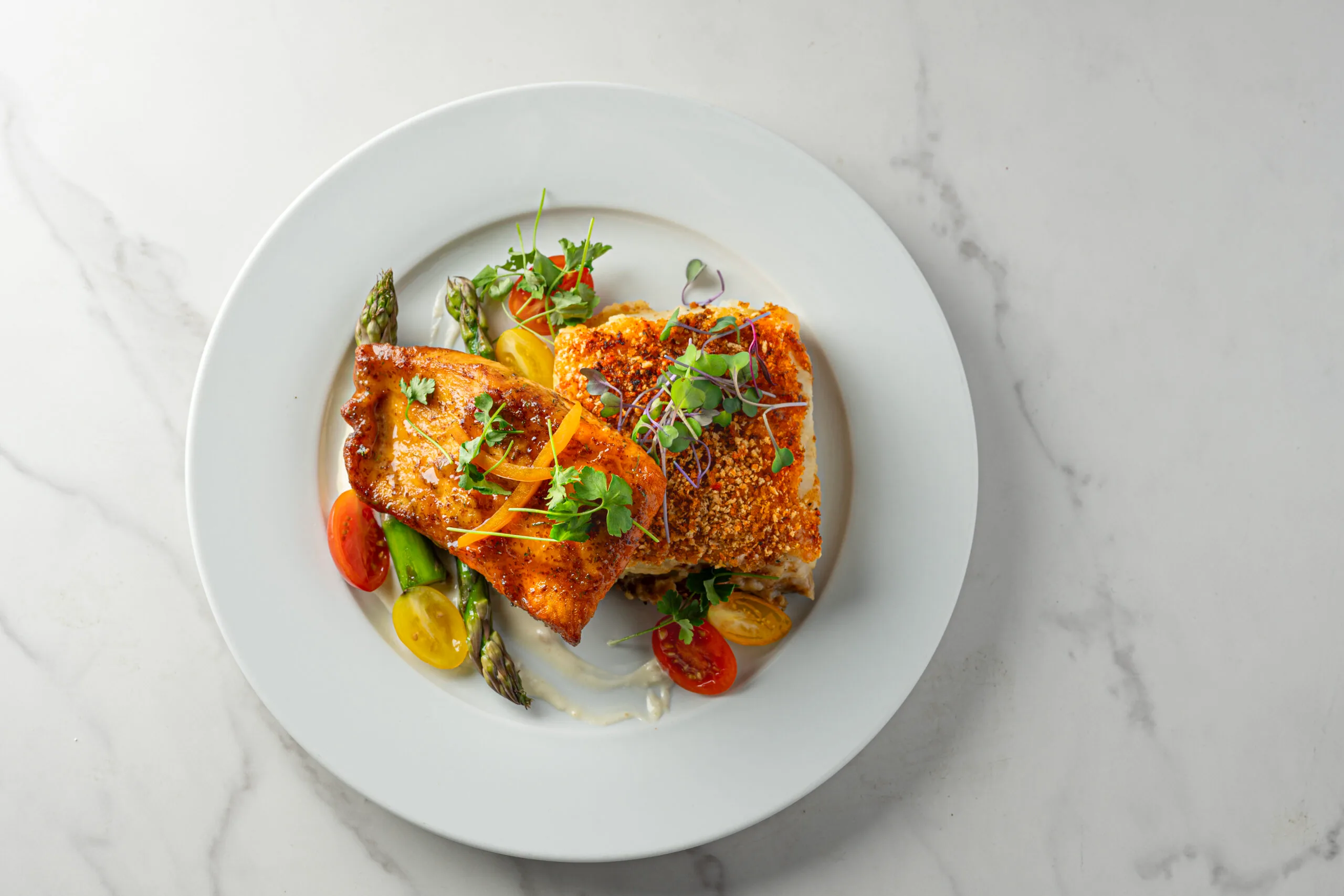 A plate of food on a marble surface