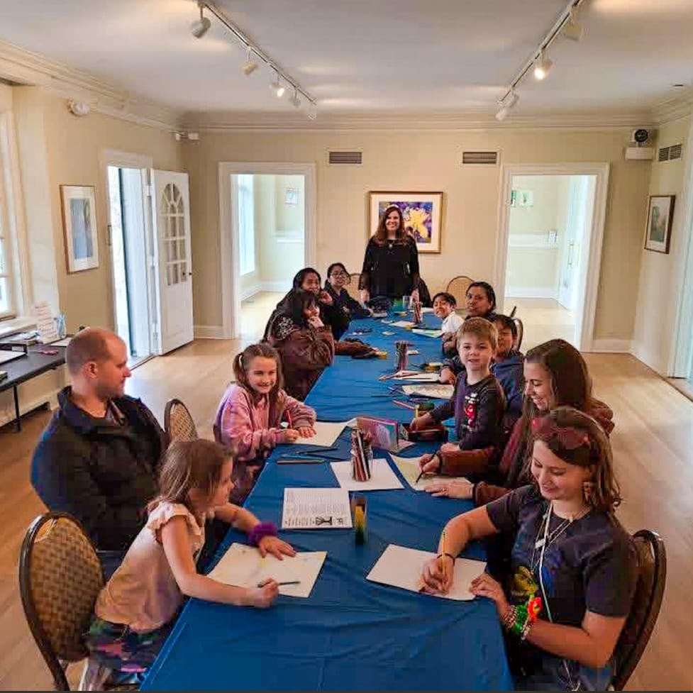 Children participating in art activity workshop at danada house