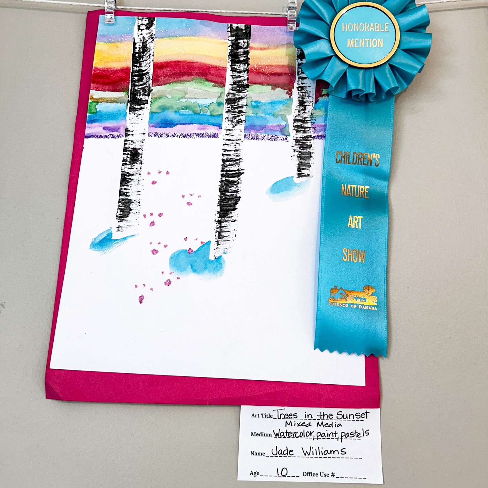 Trees in the sunset watercolor painting by jade williams age 10 with honorable mention ribbon