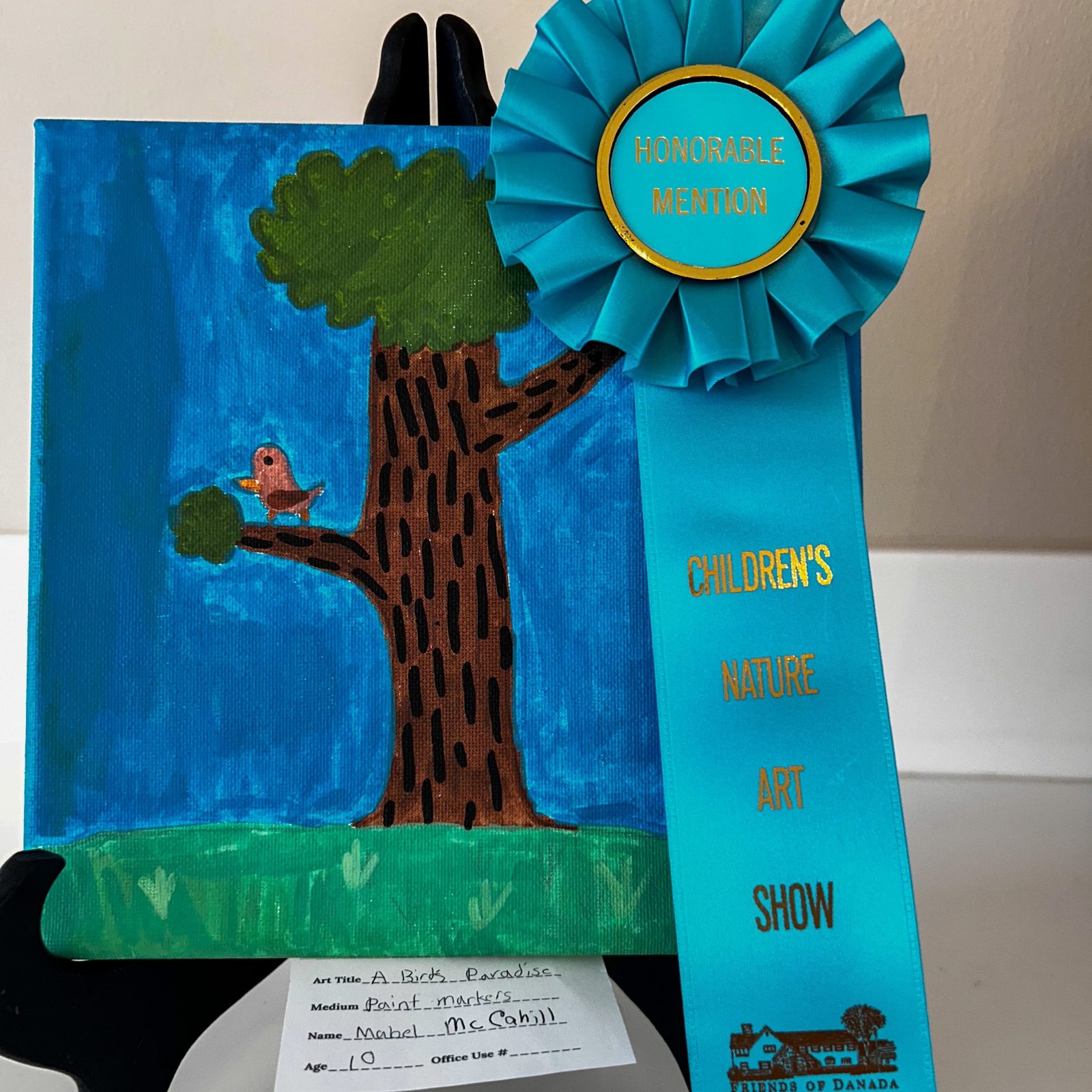 A bird's paradise painting by mabel mccahill age 10 with honorable mention ribbon