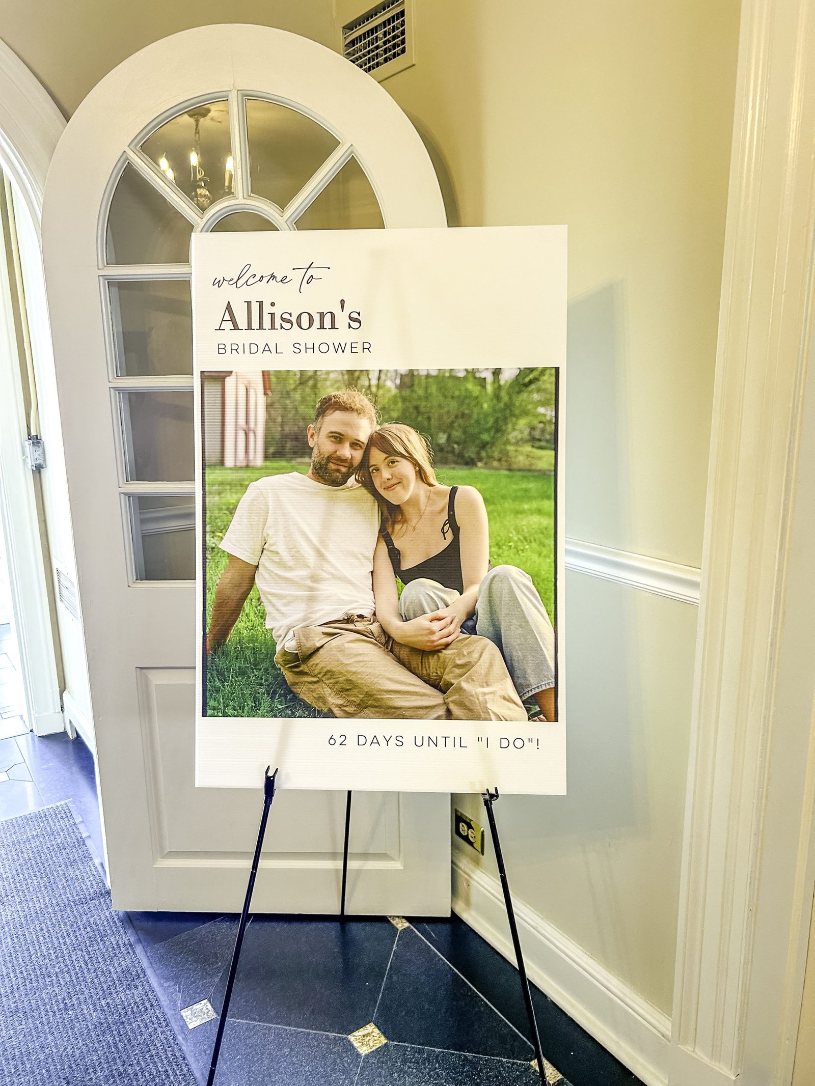 Elegantly set round table with pink napkins and florals