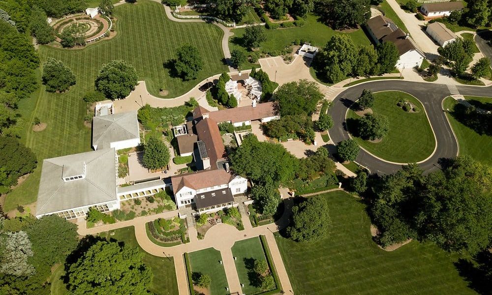 Aerial-Drone-Photo-Of-Danada-House-Mansion-And-Barns-At-The-Danada-Forest-Preserve-In-Wheaton-Illinois Aerial photo of danada house estate in wheaton